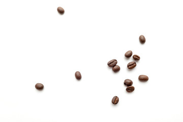 Coffee beans isolated on white background. Close-up.