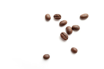 Coffee beans isolated on white background. Close-up.