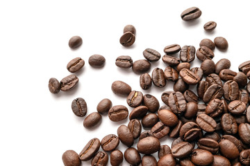 Roasted coffee beans isolated on white background. Close-up.