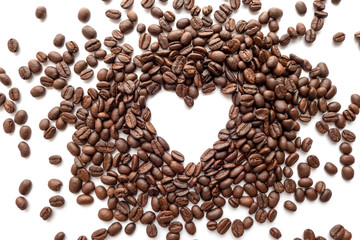 Heart frame of roasted coffee beans with area for copy space.