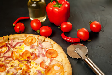 Delicious   pizza on a concrete background. Top view of hot pizza. 