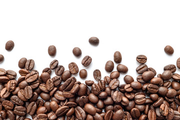 Roasted coffee beans on white background. Close-up.