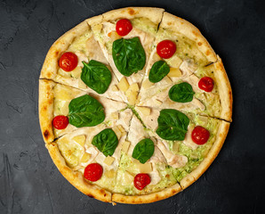 Delicious   pizza on a concrete background. Top view of hot pizza. 
