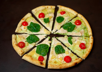 Delicious   pizza on a concrete background. Top view of hot pizza. 
