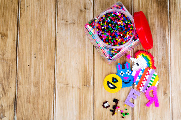 Jar with colored plastic pieces of children's mosaic