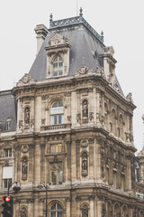 Obraz premium View from below on a facade European building in Paris, France.