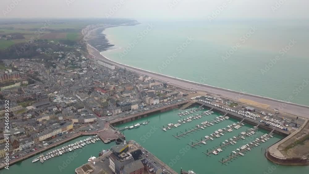 Wall mural aerial horizontal travelling video of the city and its marina and coastline in fecamp normandy franc