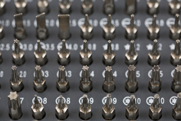 Closeup of set of screwdriver heads of various types.