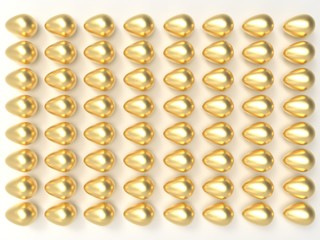 golden easter eggs on light background