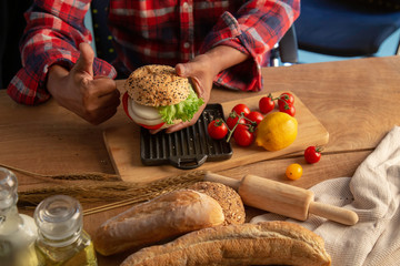 Chef making hamburger homemade.
