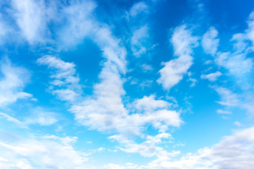 Naklejka na ściany i meble Blue sky with white clouds. Daytime and good weather
