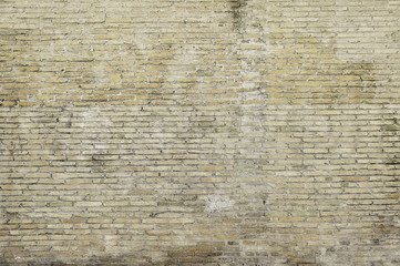 Old grey brick wall background texture