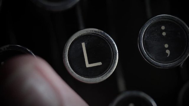 Macro close up of the L key on an old Typewriter.