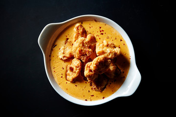 Fried chicken with cheese sauce