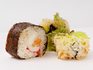 Sushi rolls on a white background. fast healthy food
