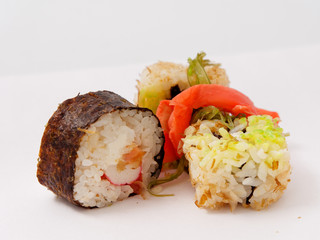 Sushi rolls on a white background. fast healthy food