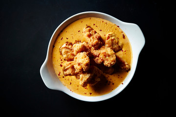 Fried chicken with cheese sauce