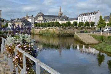 Wall murals River Laila and abbey Sainte Croix at Quimperlé, a commune in the Finistère department of Brittany in northwestern France.
