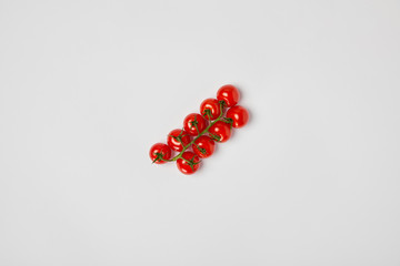 top view of cherry tomatoes on grey background