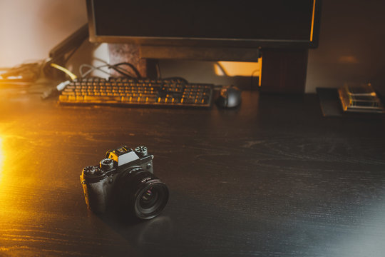 Fujifilm X-T3 camera on dark desk
