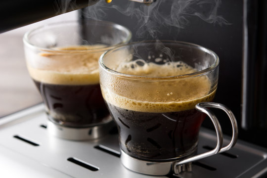 Close up fresh coffee in espresso coffee machine