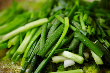 Cooking garlic chives in pot 