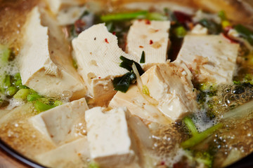 Cooking tofu in pot