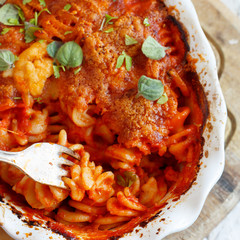 Baked pasta with tomato sauce and mozzarella cheese