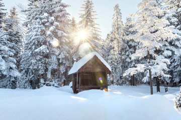 snow mountain landscape with summer house.