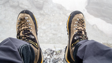 Mountain shoes in a cloudy morning