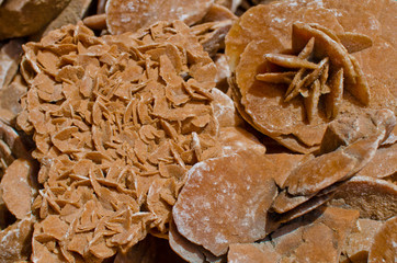 Desert rose. Rock composed of gypsum, water and sand, formed in the deserts and forms very beautiful crystals that resemble the shape of a rose.