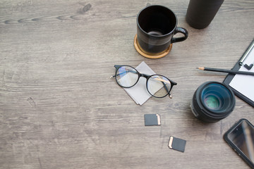 Photographer accessories on wooden table, Lifestyle concept, Close up, Copy space.