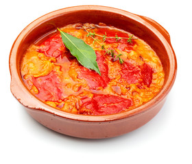 Peppers (del Piquillo) stuffed with meat or fish. Roasted red peppers and fillings made at home. Recipe of Spanish food and Mediterranean diet. Isolated on white background.