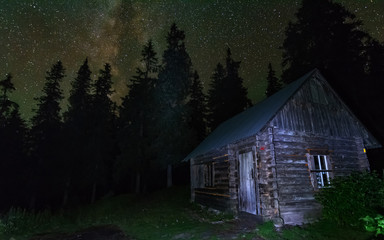 Charming lunar and starry nights with the Milky way in the Ukrainian Carpathians with mountain...