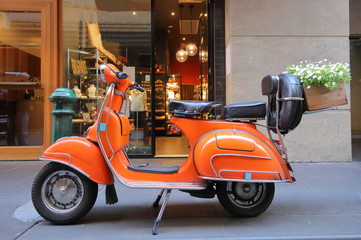 Orange scooter motorbike flower basket