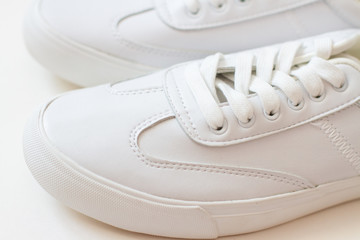 white sneackers  on white background. close up