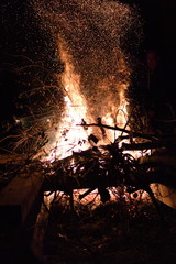 Bonfire close up embers flying