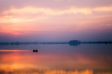 A beautiful winter morning golden light at river with its beautiful reflection 