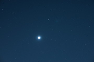 Fototapeta na wymiar Blue moon stars night sky