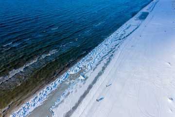 Icy Baltic sea coast in winter at Liepaja city, Latvia.