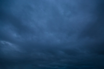 Dark stormy sky. Gloomy clouds. Overcast weather - obrazy, fototapety, plakaty