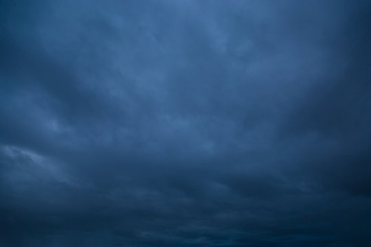 Dark stormy sky. Gloomy clouds. Overcast weather