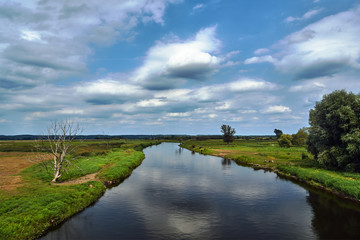 Fototapeta na wymiar Notec River and rural landscape in summer in Poland..