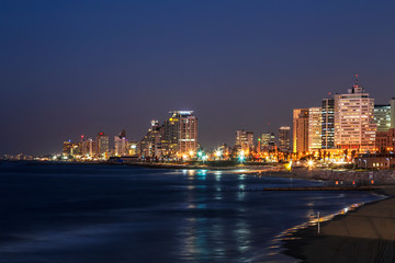 Fototapeta na wymiar View of the night Tel Aviv and and coastal waters of the Mediterranean. Israel