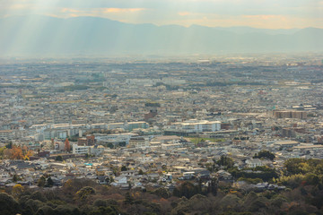 Nara city view from Wakakusa mountain national park on evening autumn season time.