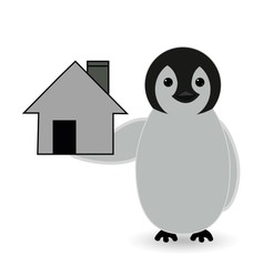 penguin standing near house