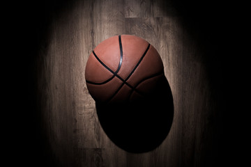 Fototapeta premium Basketball ball spotlight