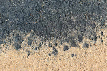 sandy coast close up. sand of different colors. top view