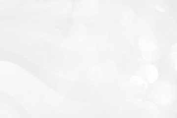 White trendy background with a smooth bend of lines and cosmic waves, illustration for a modern beautiful design. Texture of festive gray sparkles, a pattern for wallpaper on the screen saver.