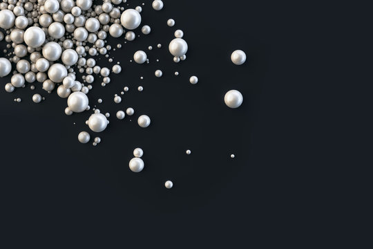 Rozsypane perły w prawym-g&oacute;rnym rogu na czarnym tle